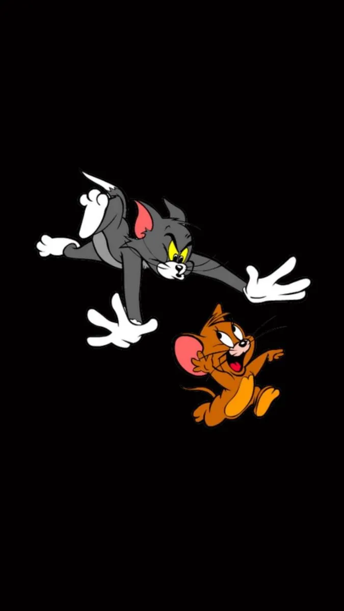 Tom surprised as Jerry runs past on black background