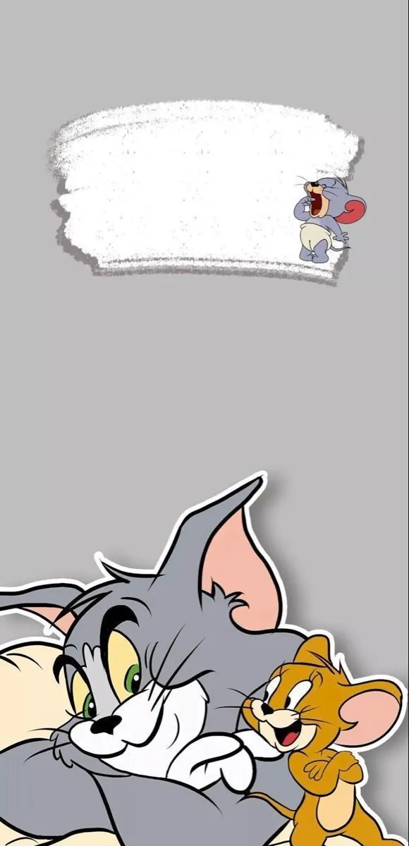 Tom surprised with Jerry pointing and a speech bubble