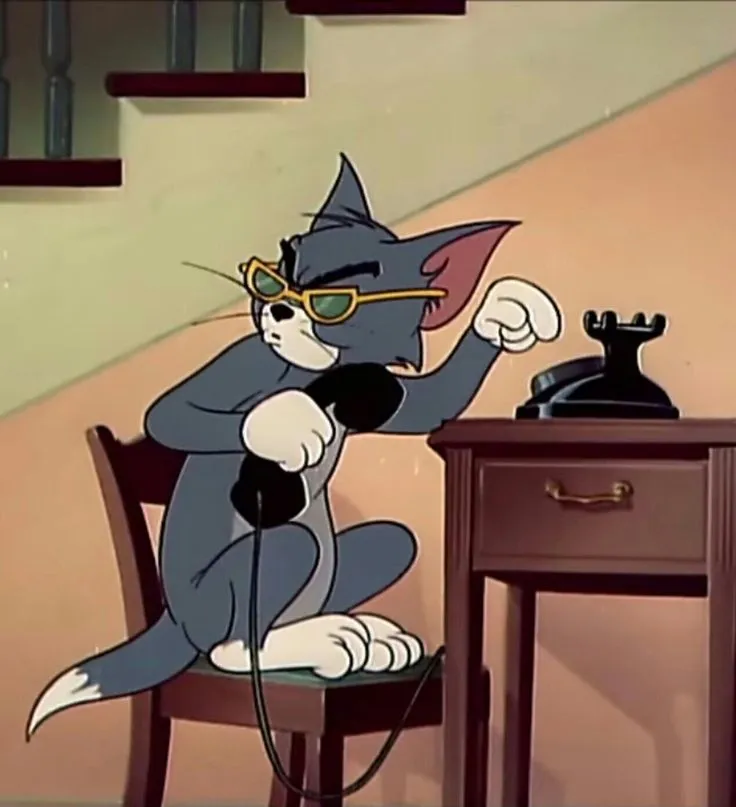Tom the Cool Cat Talking on the Phone free wallpaper