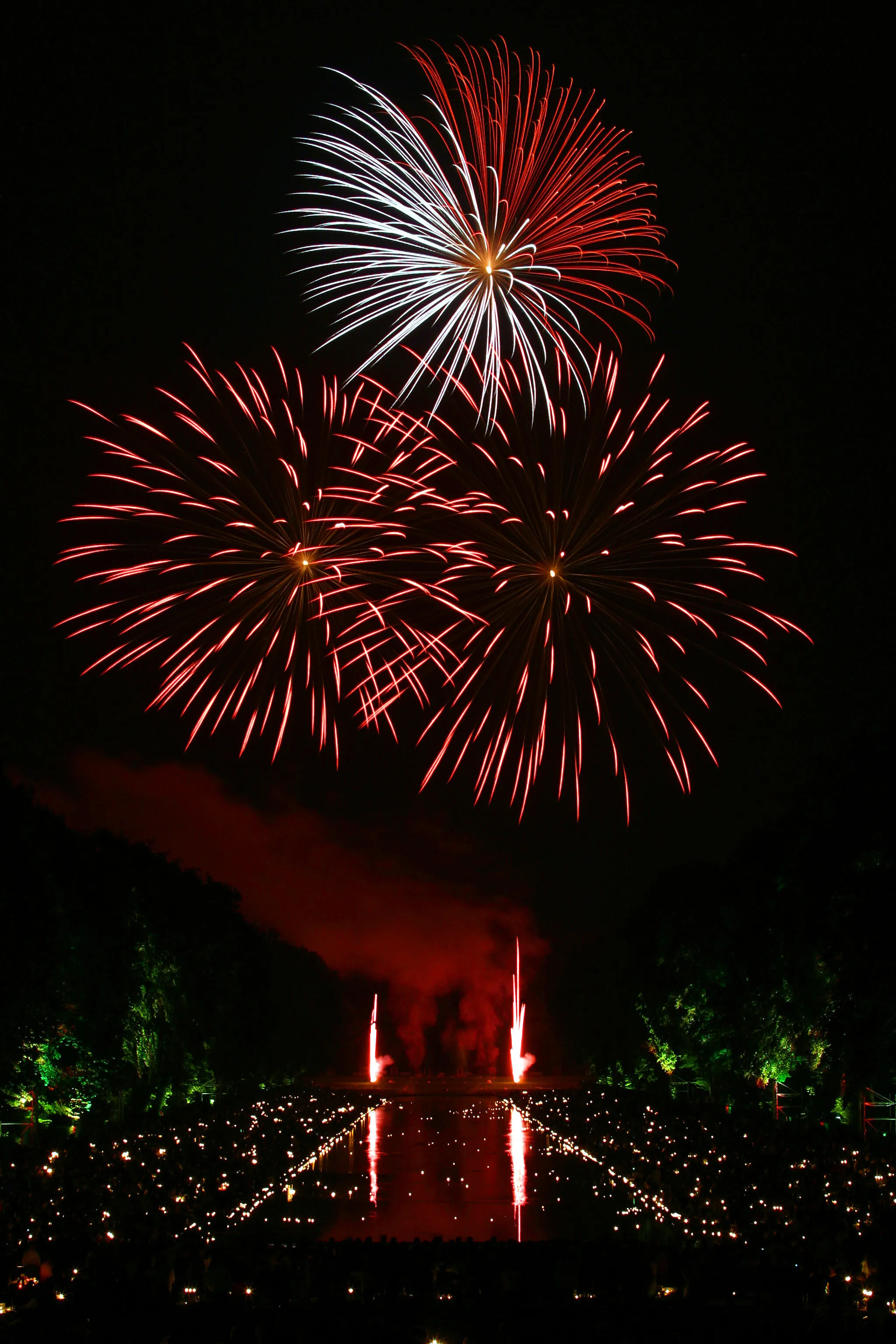 Amazing Sky Firework Show With Boats Sailing in Water Images