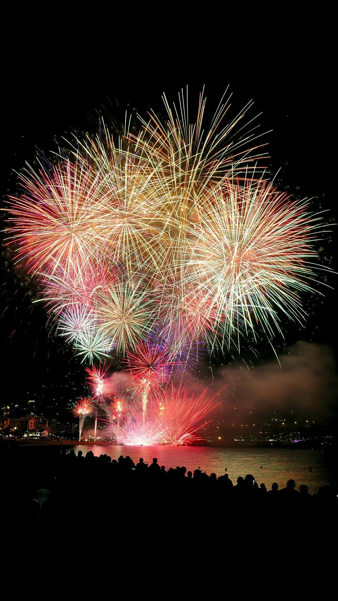 Beautiful Fireworks in a River with Amazing Bridge View