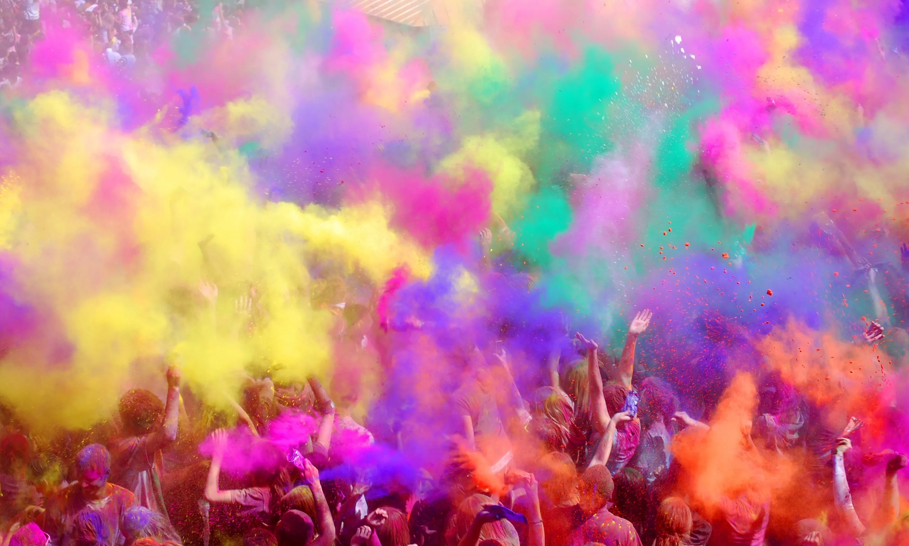 Colour Explosion Celebration with a Happy Festival Crowd