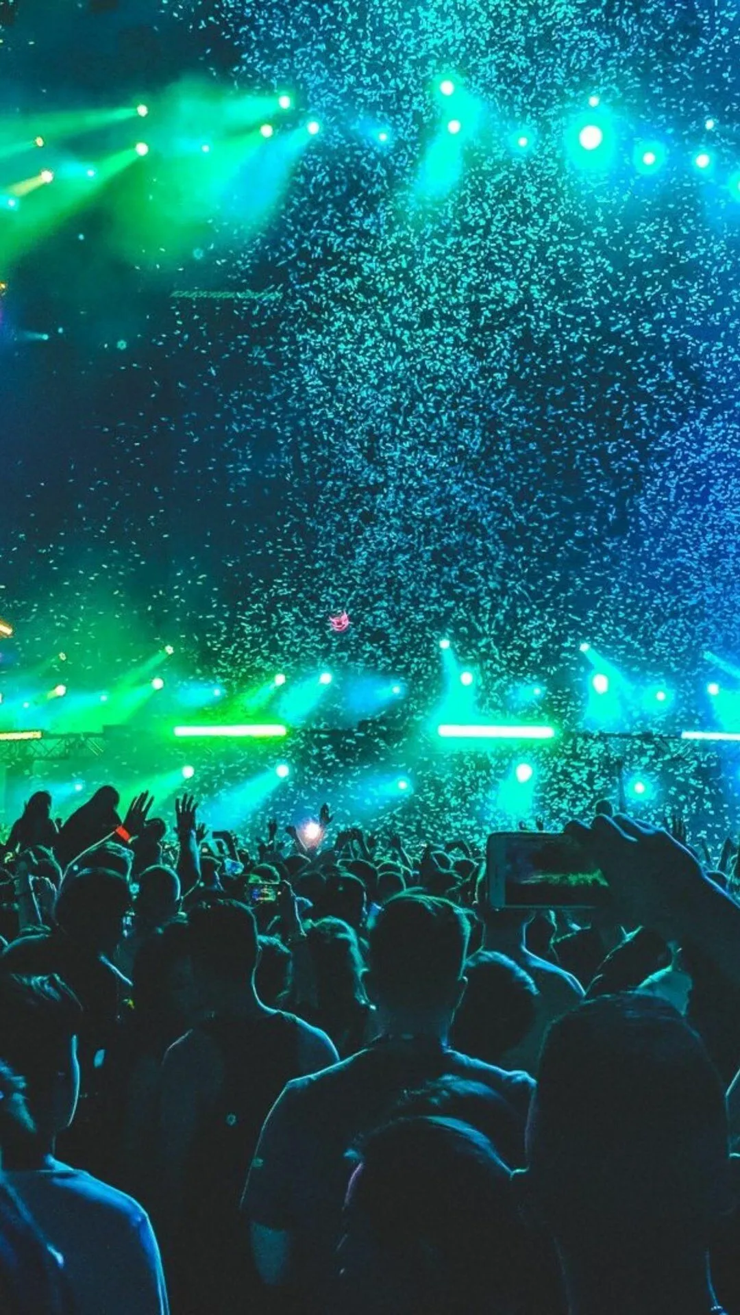 Crowd Partying in a Blue Light and Cloud at Night Event