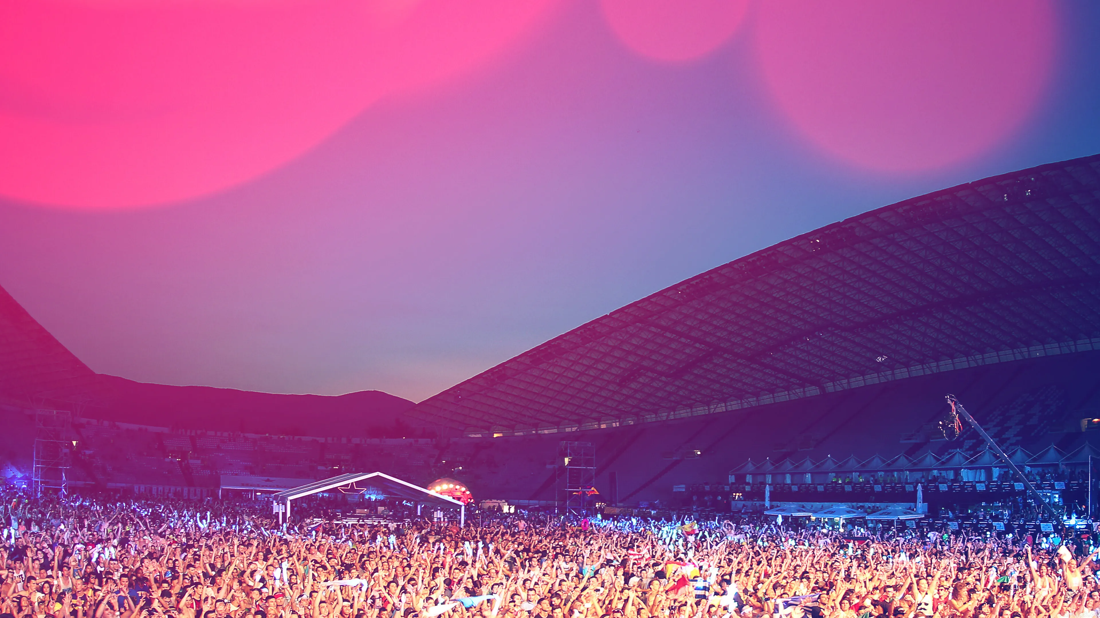Happy Crowd Celebrating with Colours at Festival Wallpaper