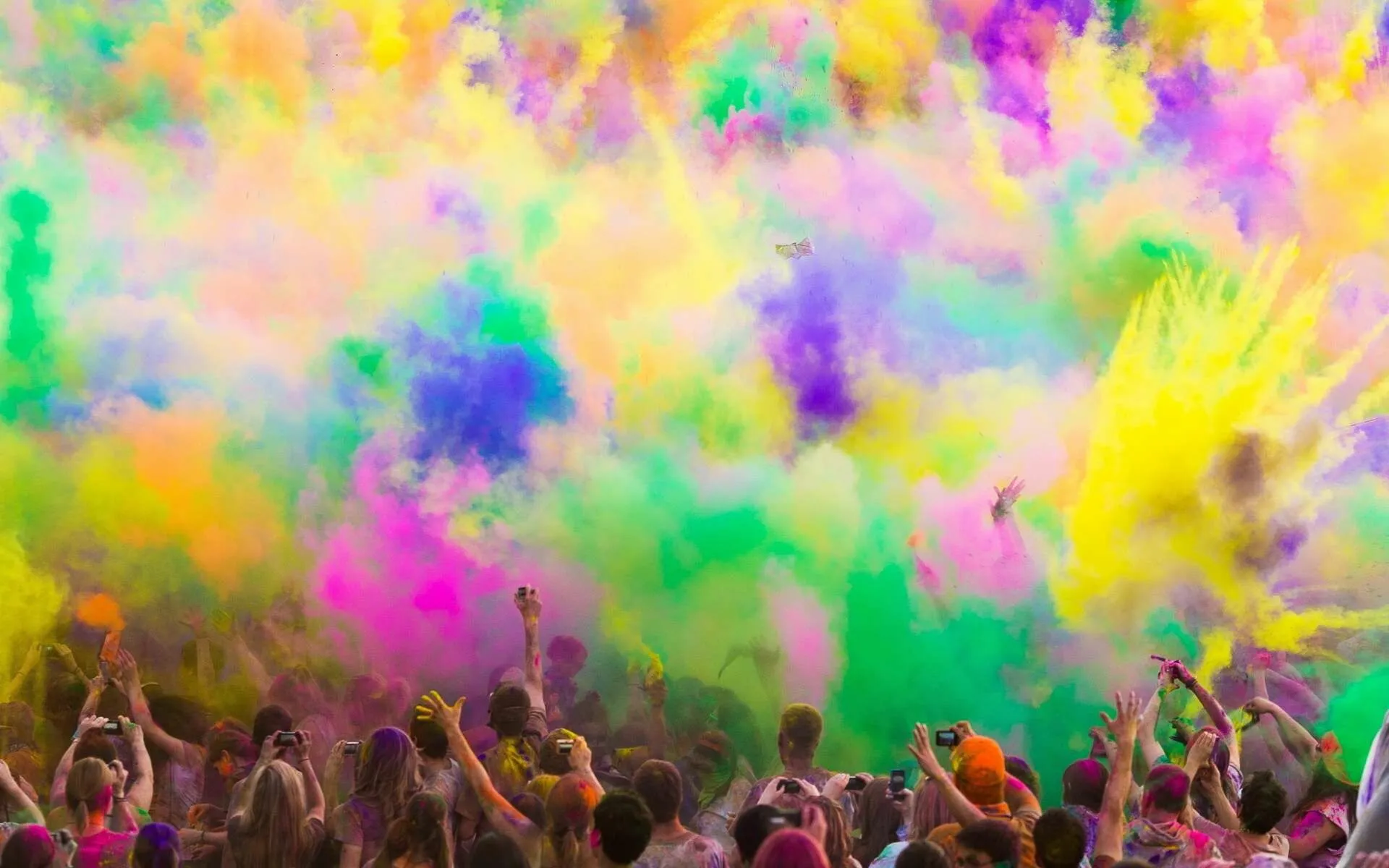 Joyful People Covered in Colours at Holi Festival Wallpaper