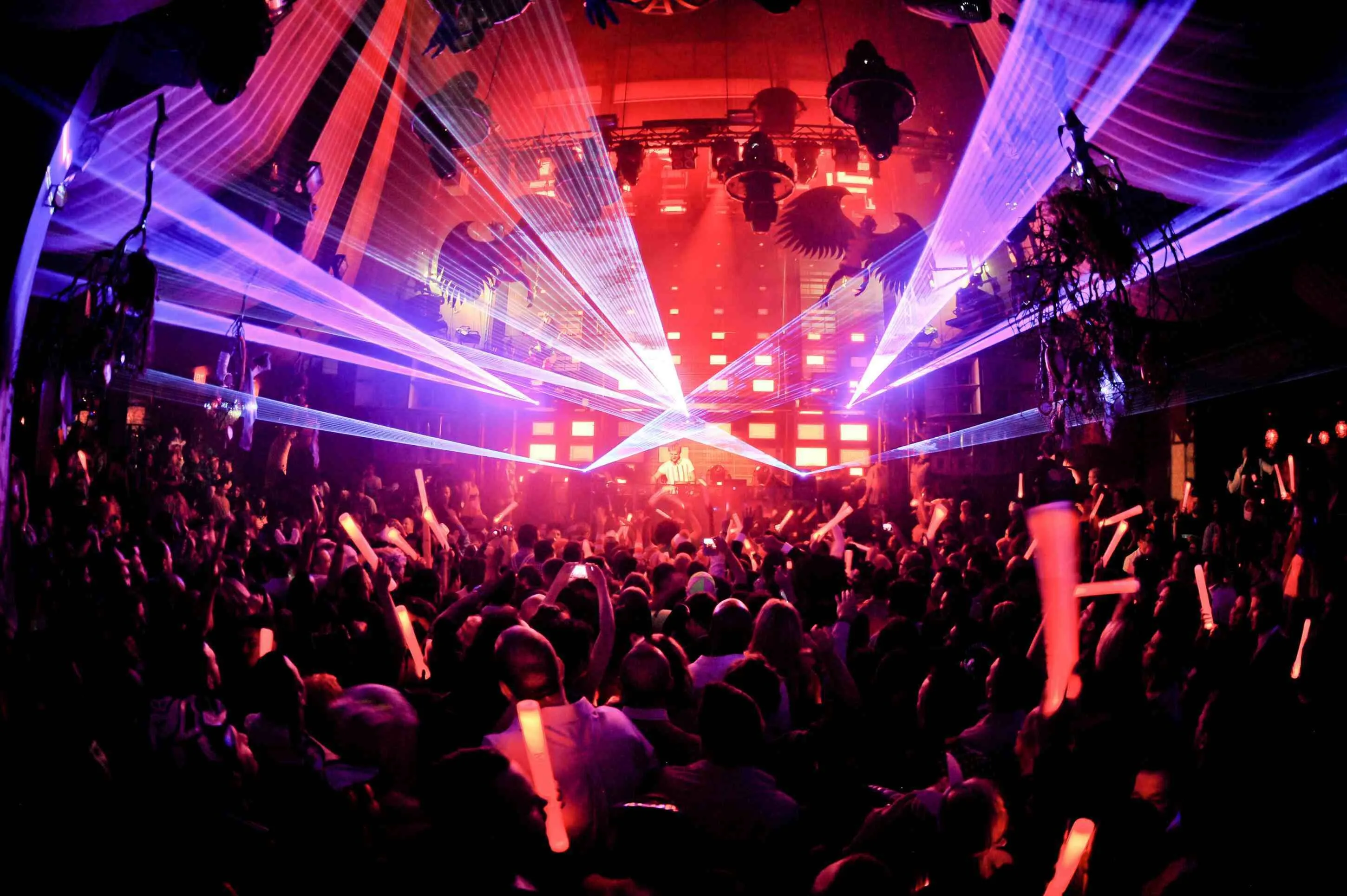 Party Vibes with Neon Lights and Shadows in Dark Wallpaper