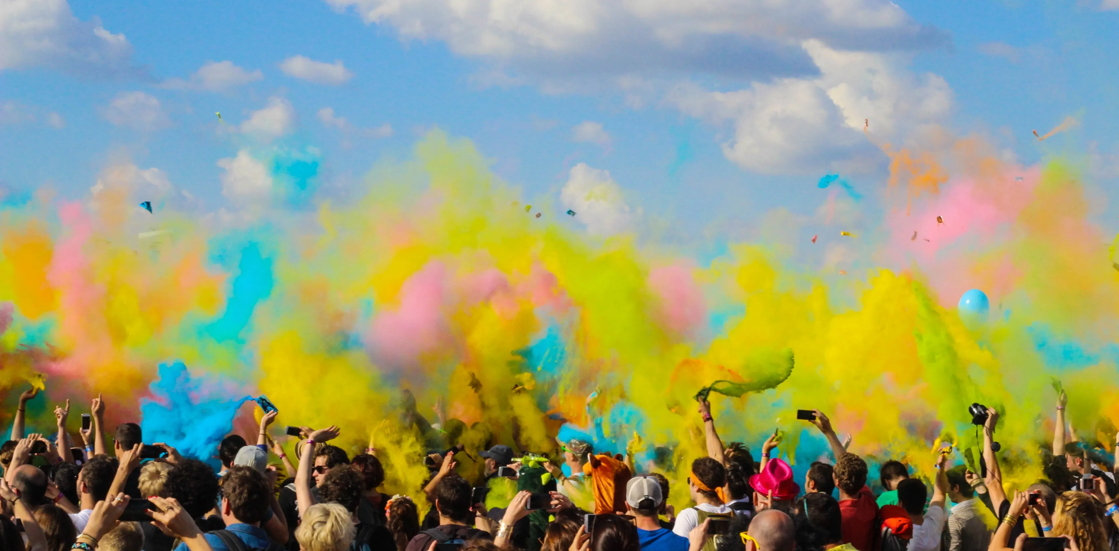 Vibrant Colour Festival with Joyful Crowd HD Wallpaper