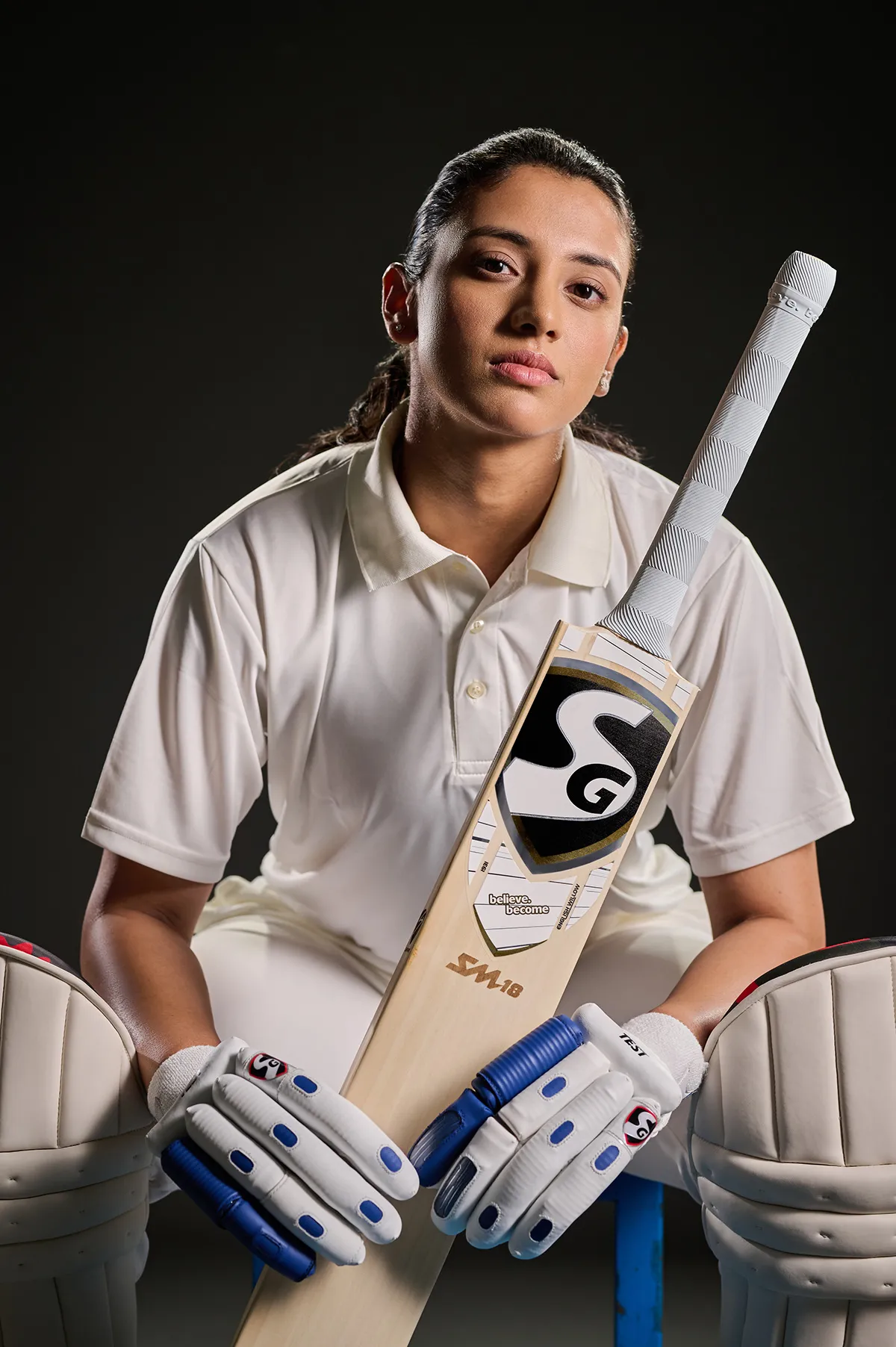 Casual sporty look with bat and jersey pose wallpaper