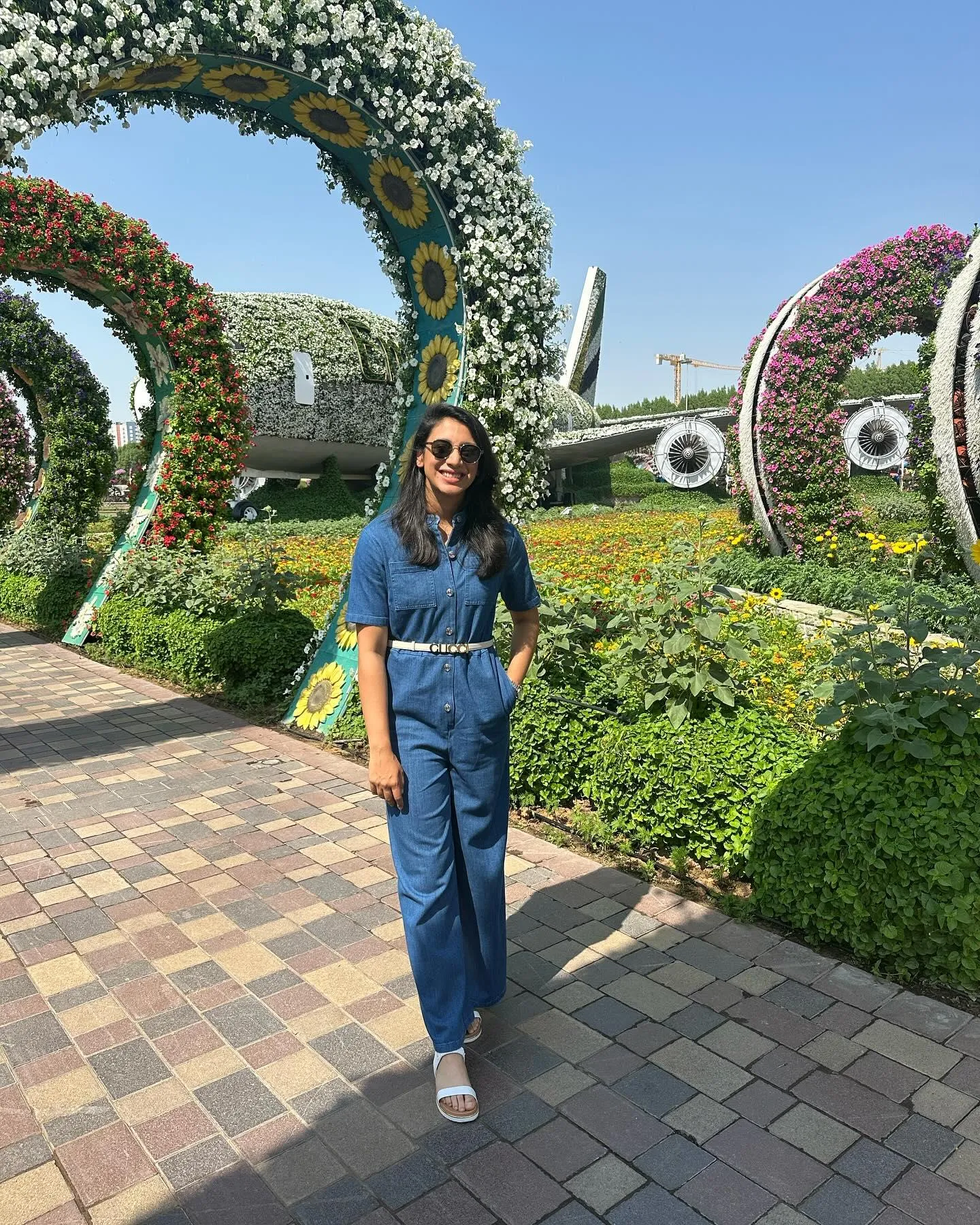 Posing under an arch in a beautiful garden wallpaper