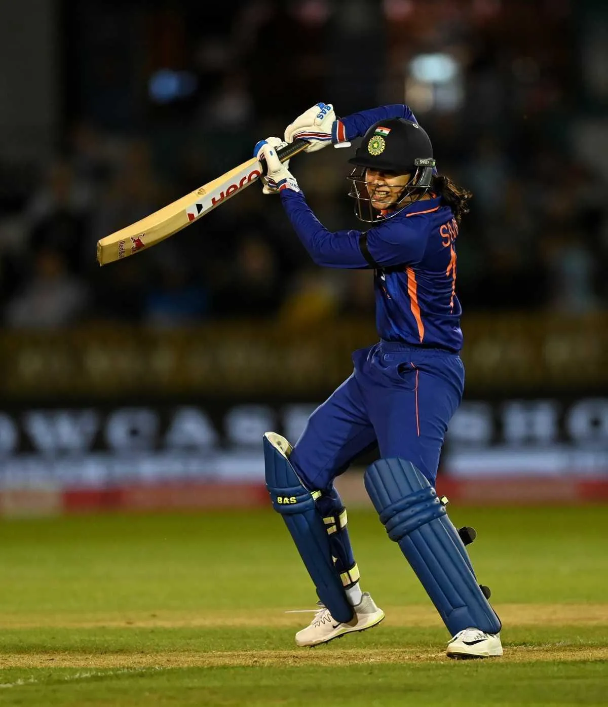 Smriti Hitting Powerful Shot During Cricket Match wallpaper
