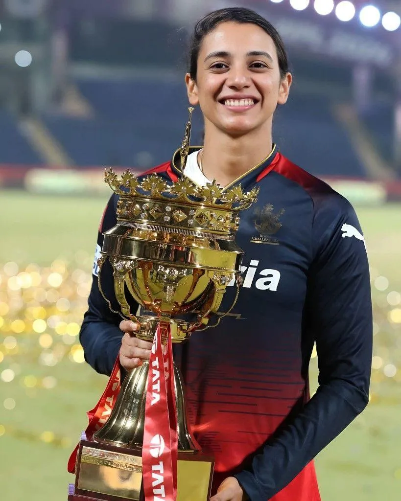 Smriti Holding Trophy and Smiling After Winning Championship