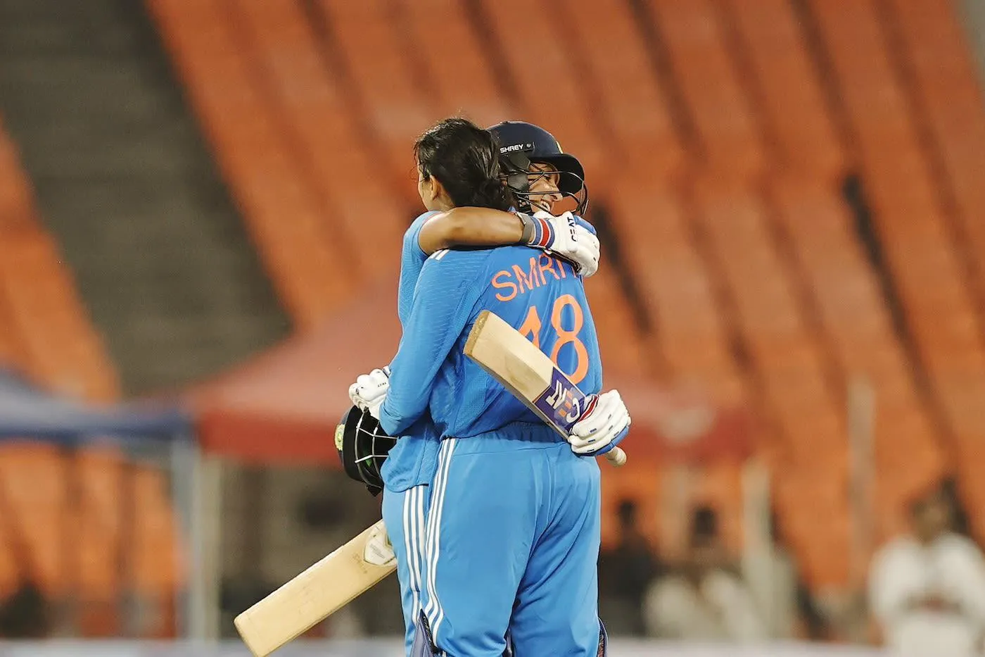 Smriti Hugging a Teammate After Winning Game wallpaper