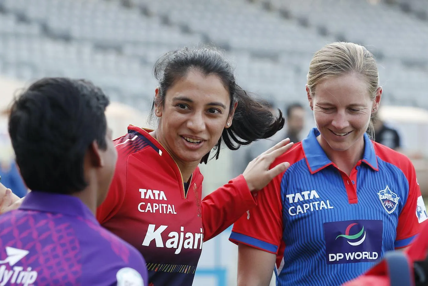 Smriti Mandhana and teammates cheering on the field