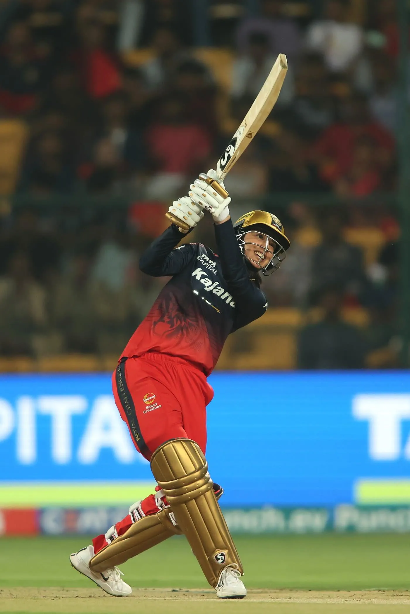 Smriti Mandhana batting in a tense match wallpaper