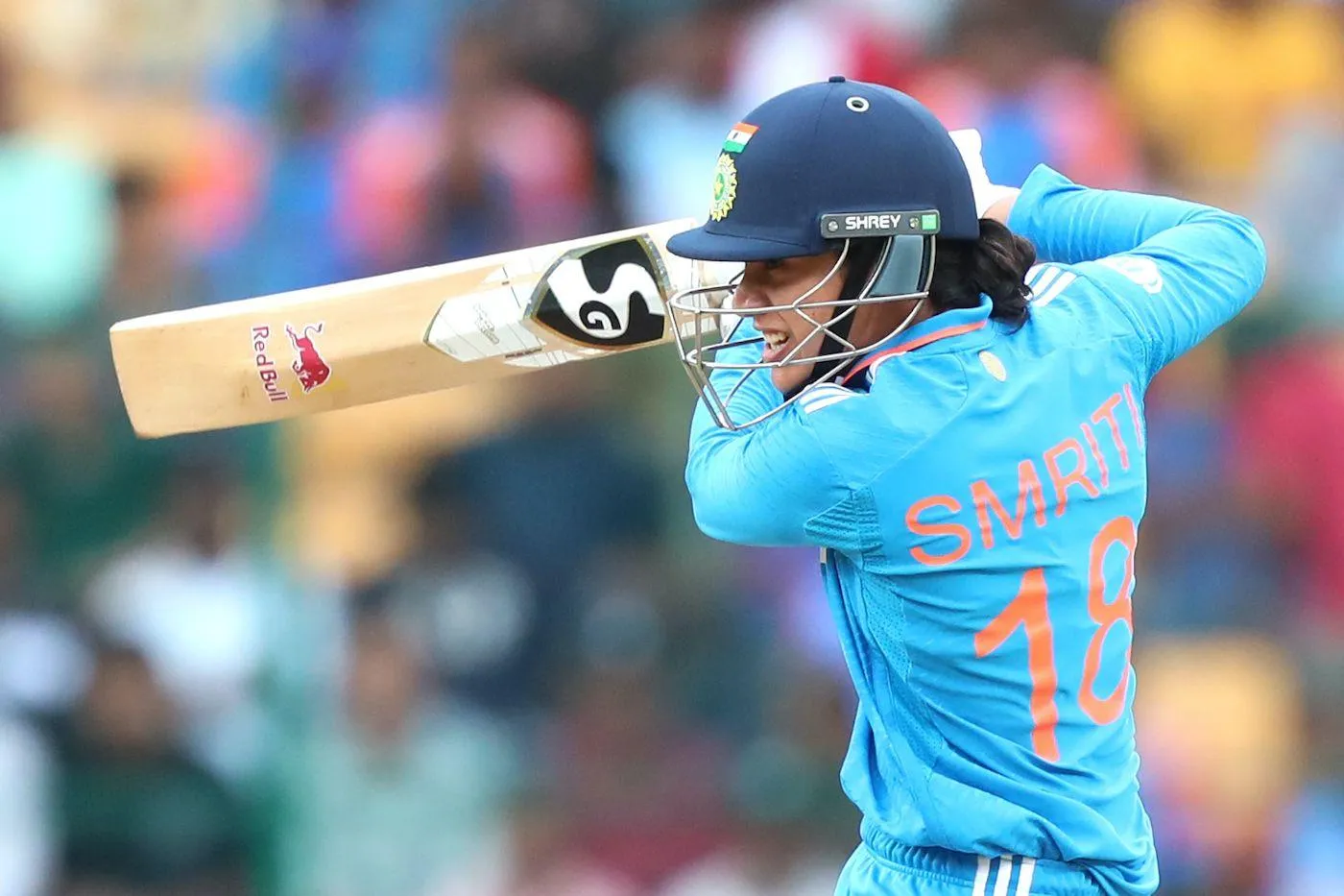 Smriti Mandhana batting in an intense cricket match