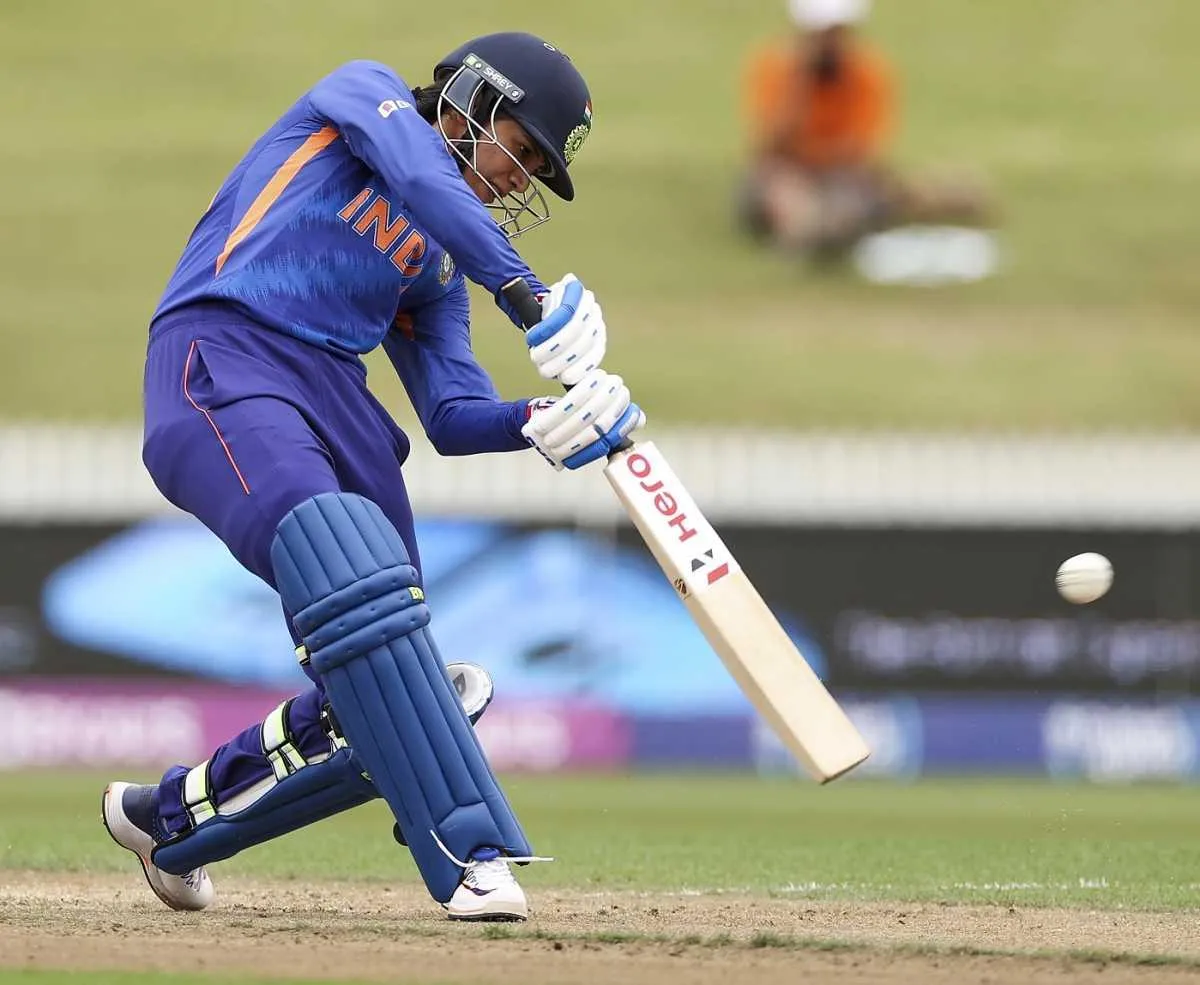 Smriti Mandhana batting with focus during an intense game