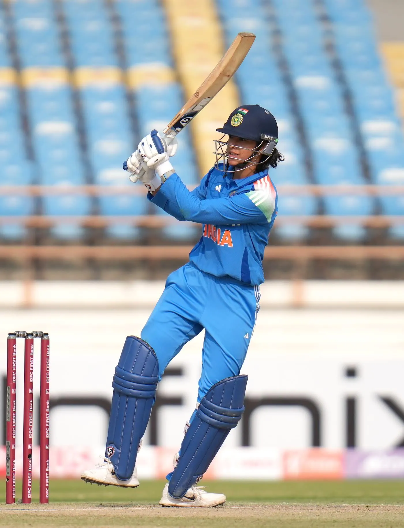 Smriti Mandhana Battling with Bat on the Field wallpaper