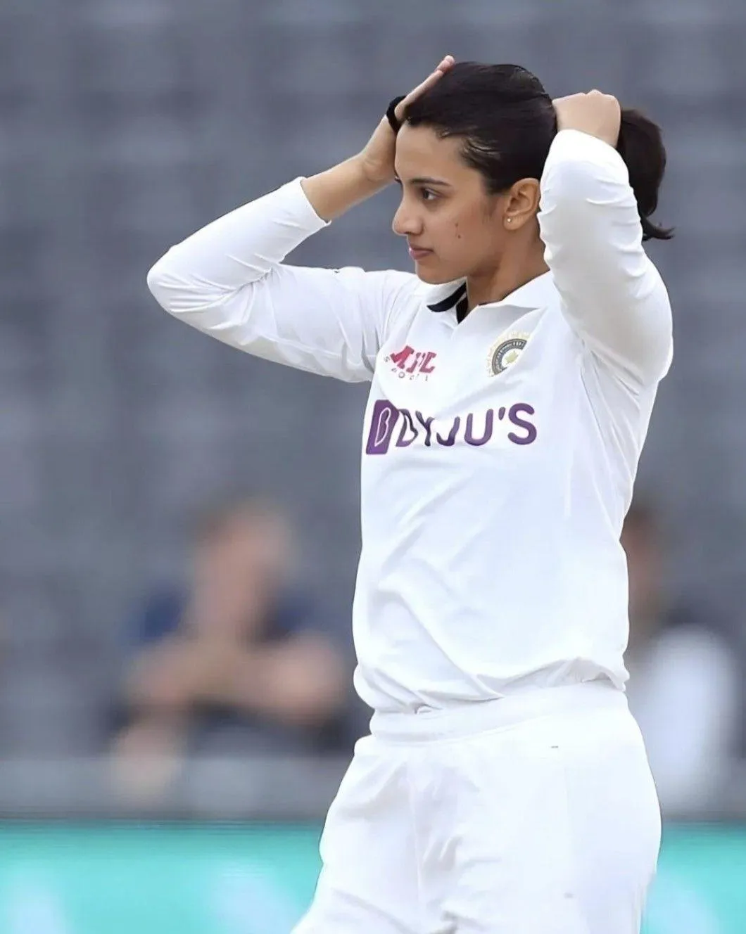 Smriti Mandhana bowling in a Test match wallpaper
