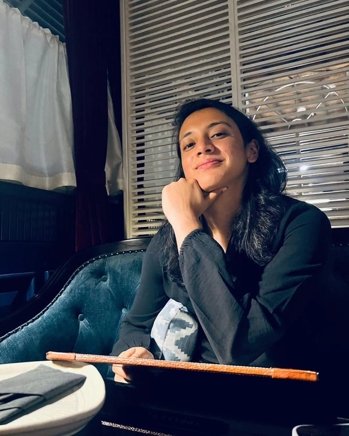 Smriti Mandhana Casual and Chic in Modern Fashion wallpaper