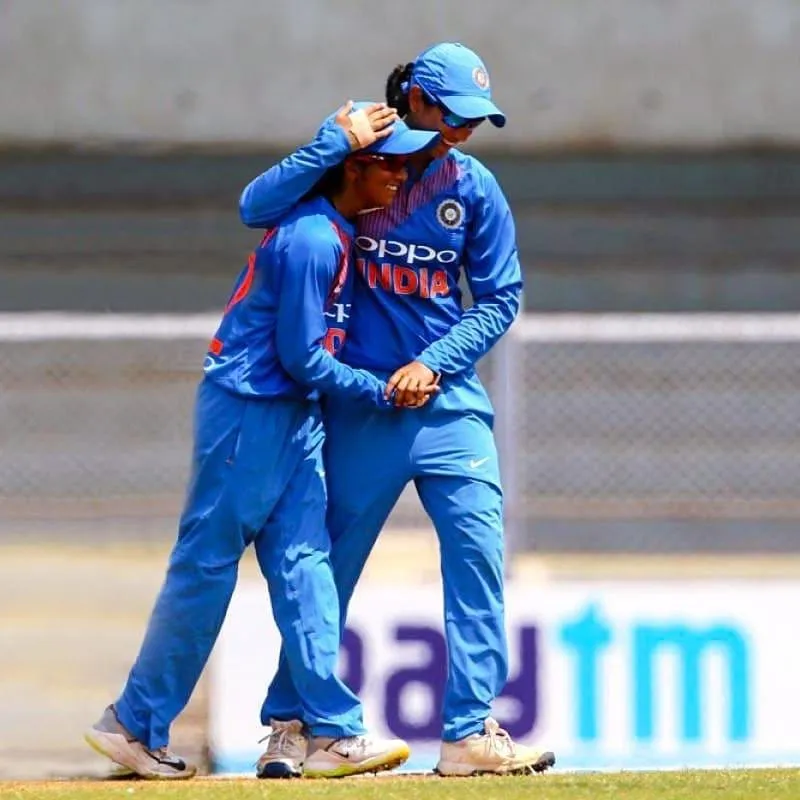 Smriti Mandhana Celebrates with Teammate After Win wallpaper