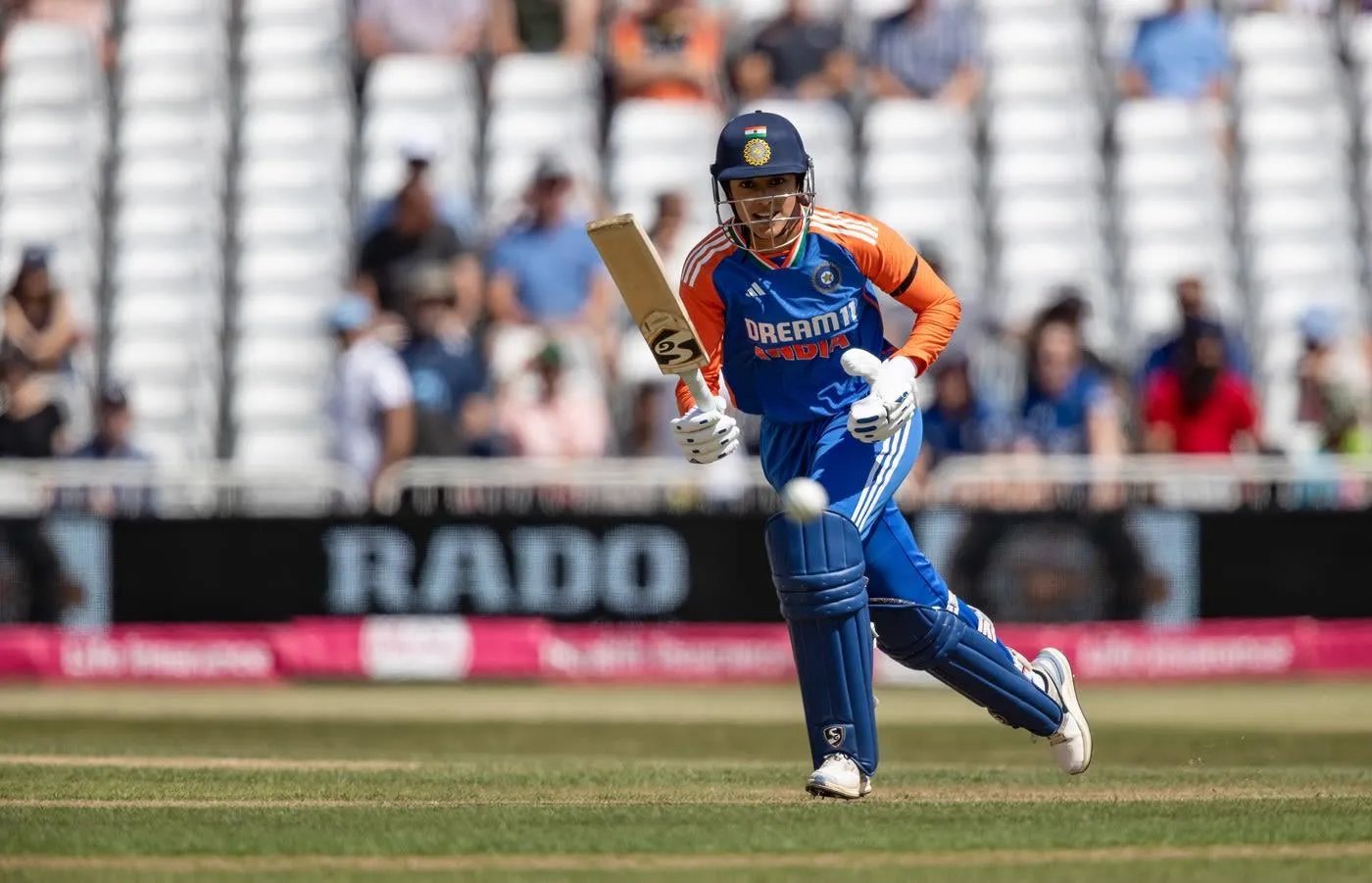 Smriti Mandhana celebrating after a powerful cricket shot