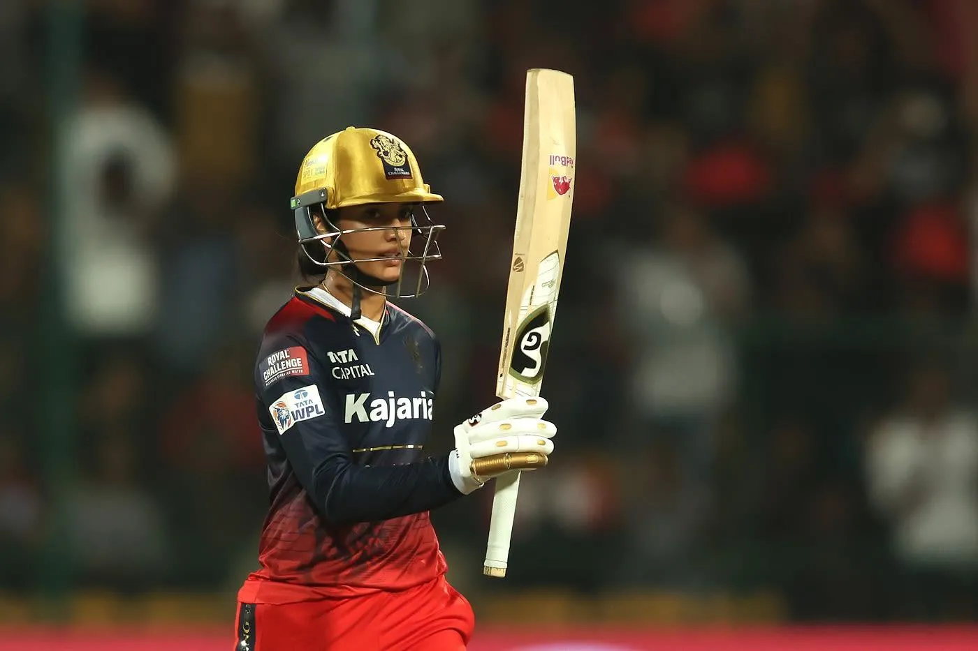 Smriti Mandhana Celebrating with Bat Raised During Match
