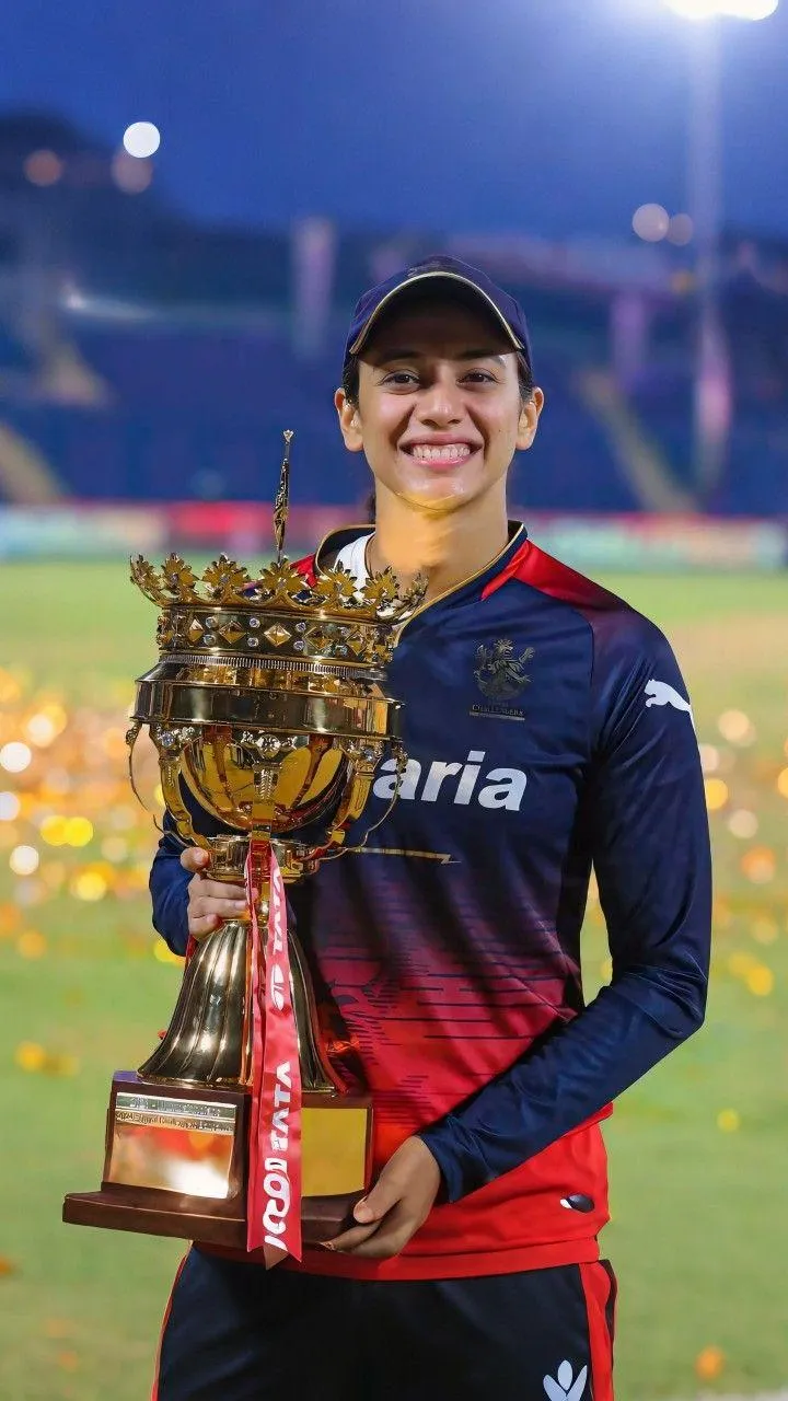 Smriti Mandhana cheering for her team from the stands