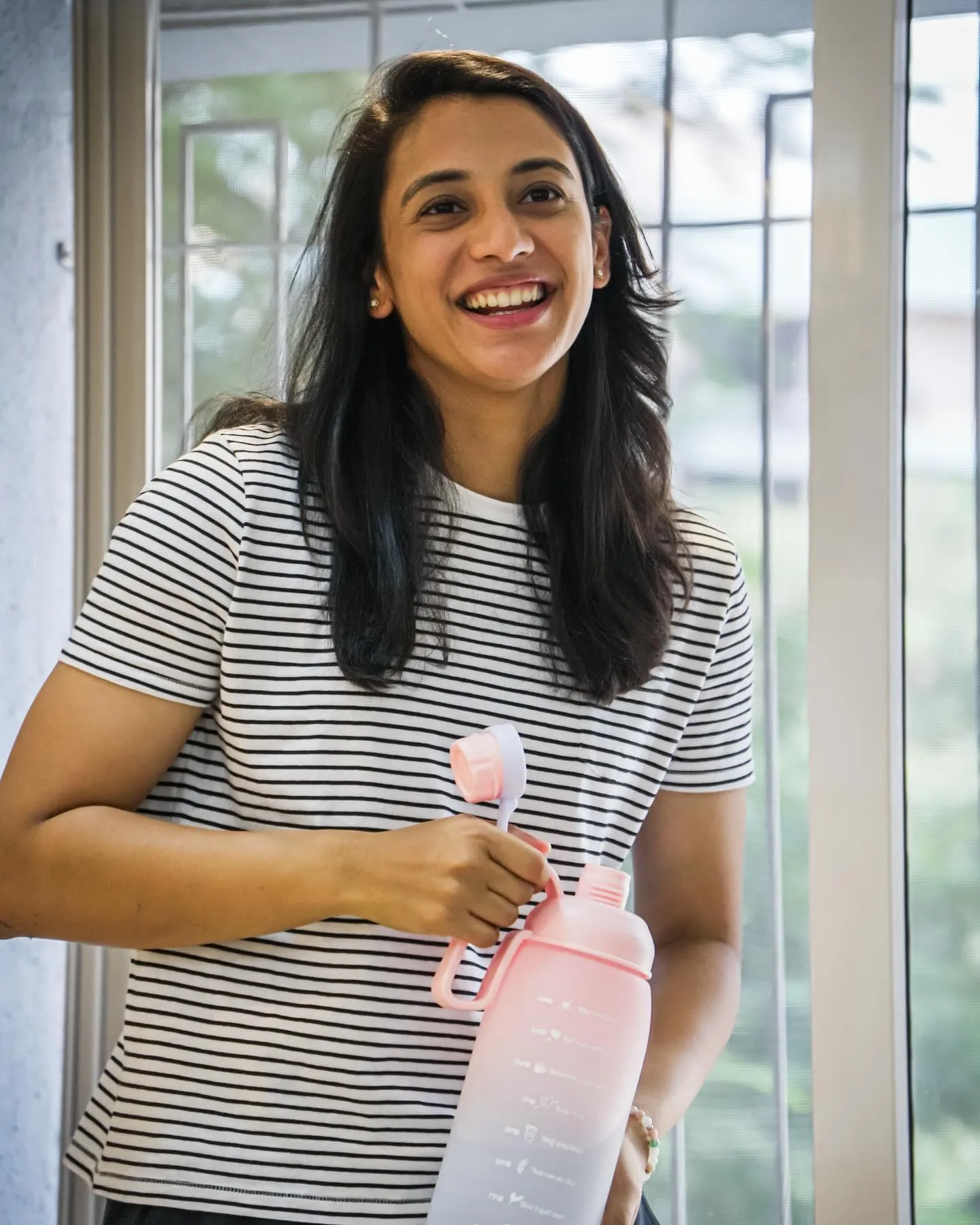 Smriti Mandhana Cooking in the Kitchen with Joy wallpaper