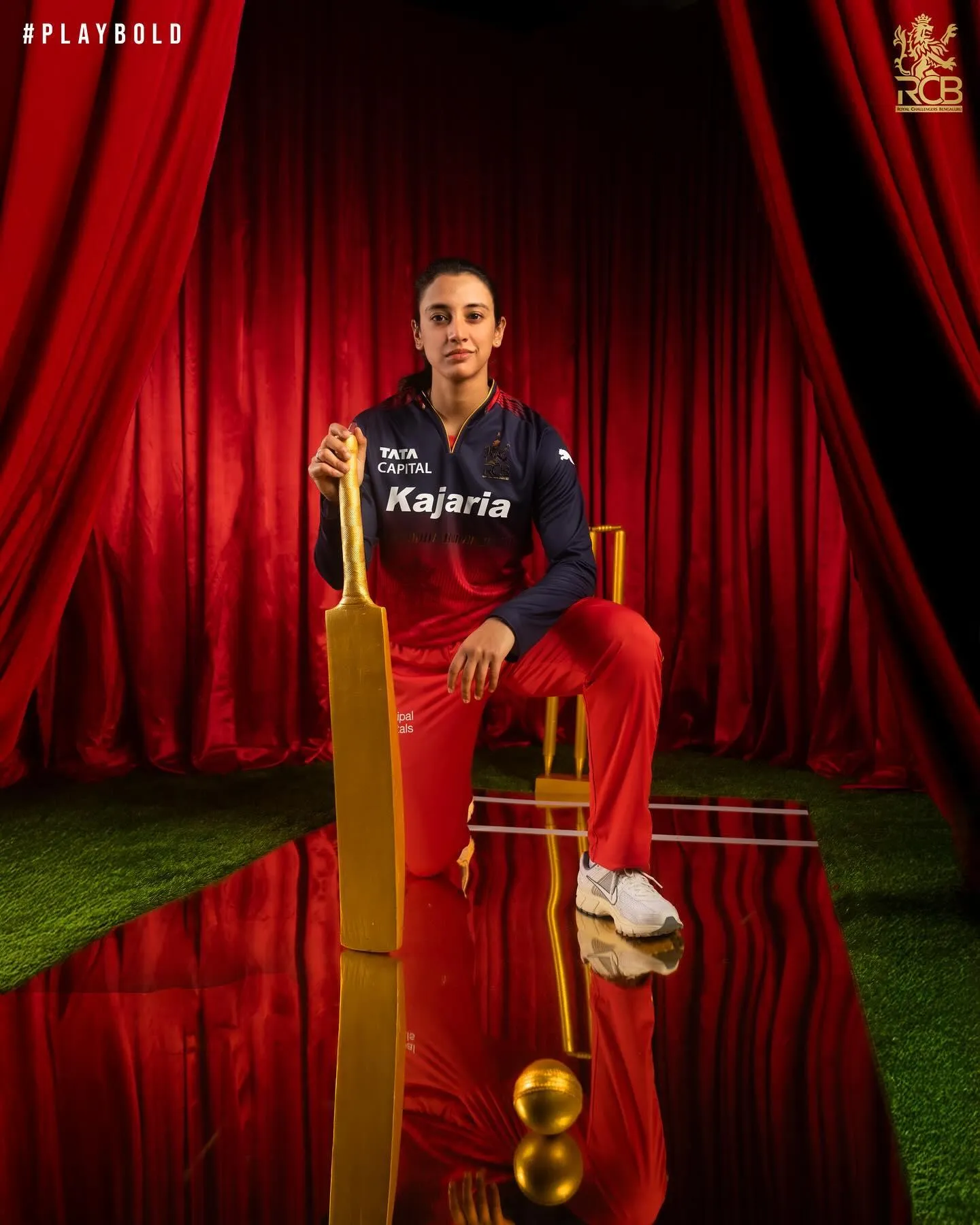 Smriti Mandhana dressed in a vibrant outfit posing