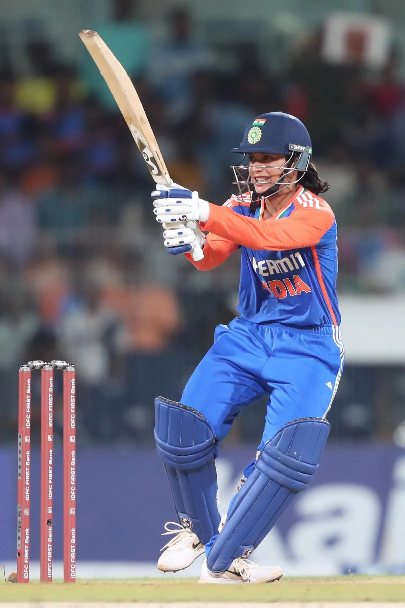 Smriti Mandhana Dressed in Stylish Cricket Gear wallpaper