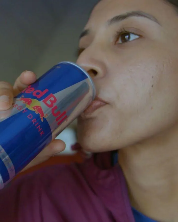 Smriti Mandhana Drinking a Beverage During a Break