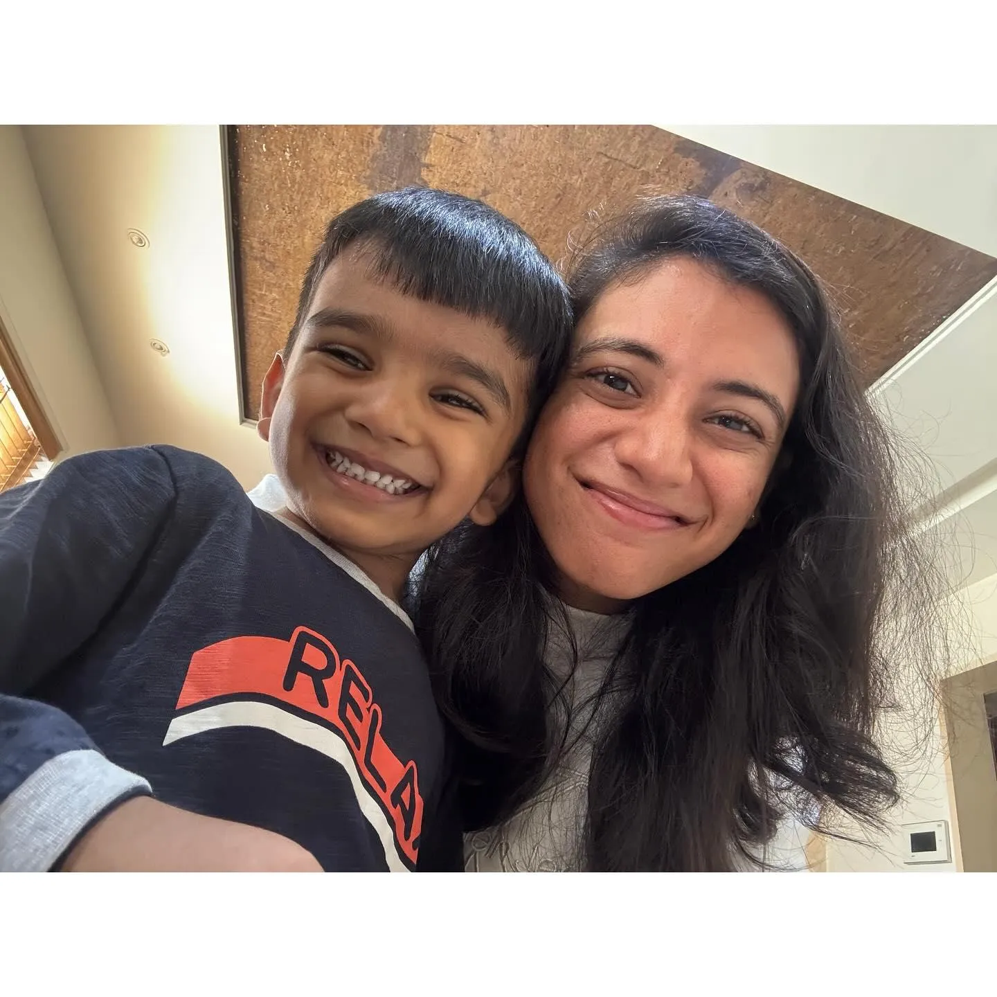 Smriti Mandhana Enjoying a Moment with Family wallpaper