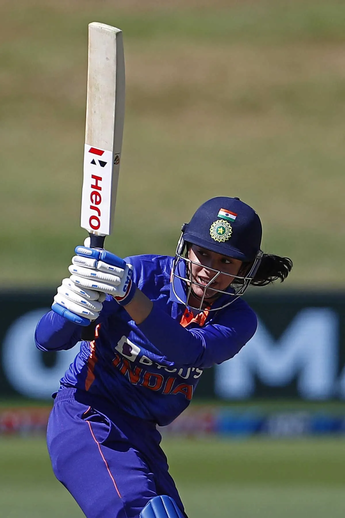 Smriti Mandhana enjoying a quiet moment with her mobile phone