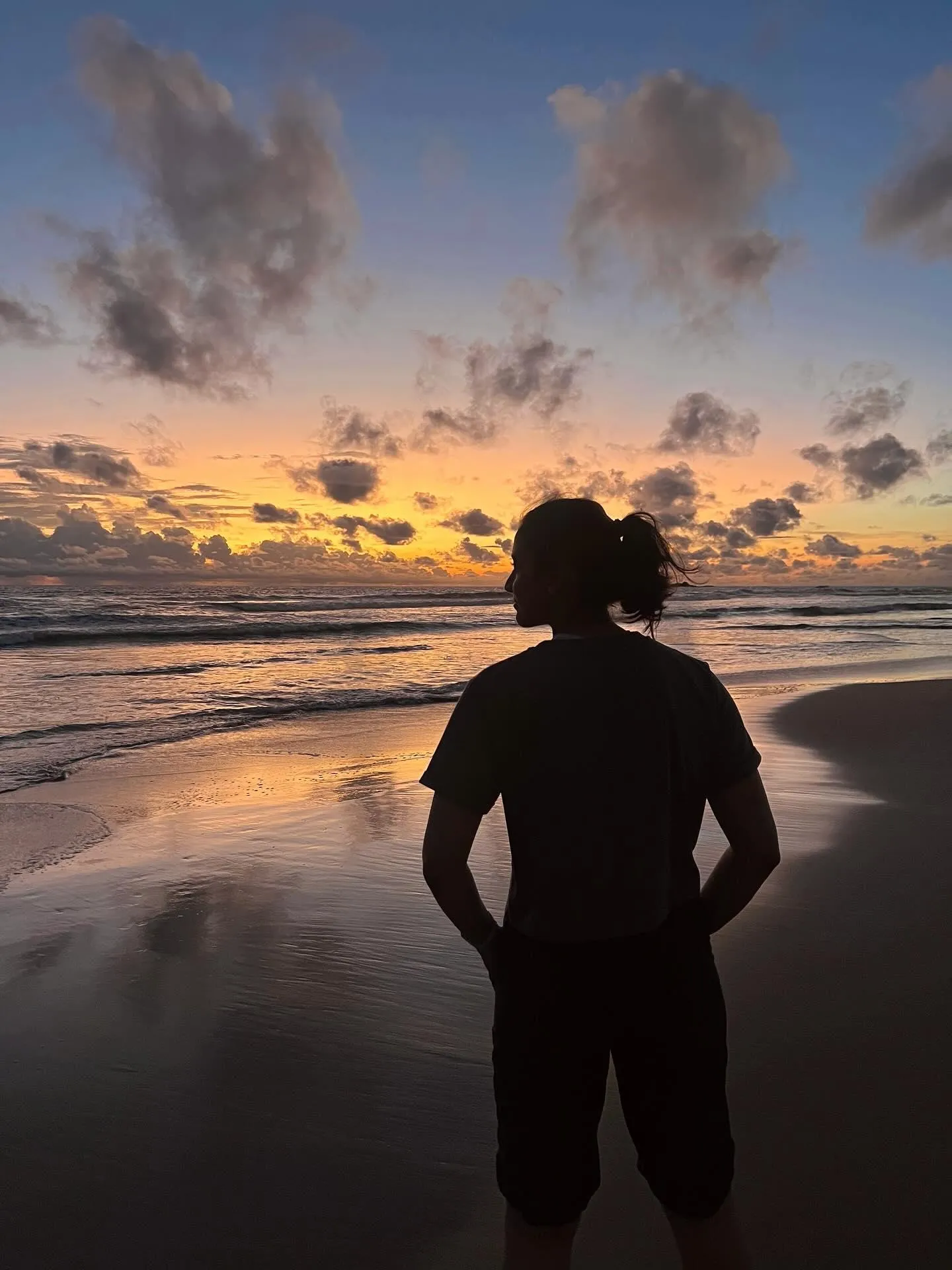 Smriti Mandhana Enjoying a Sunset Moment Outdoors wallpaper