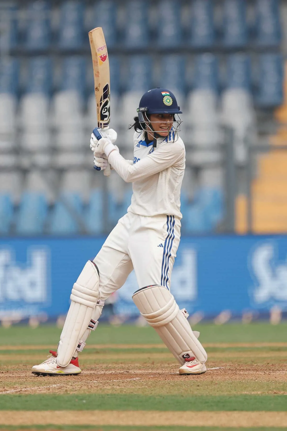 Smriti Mandhana focusing during a test match on field