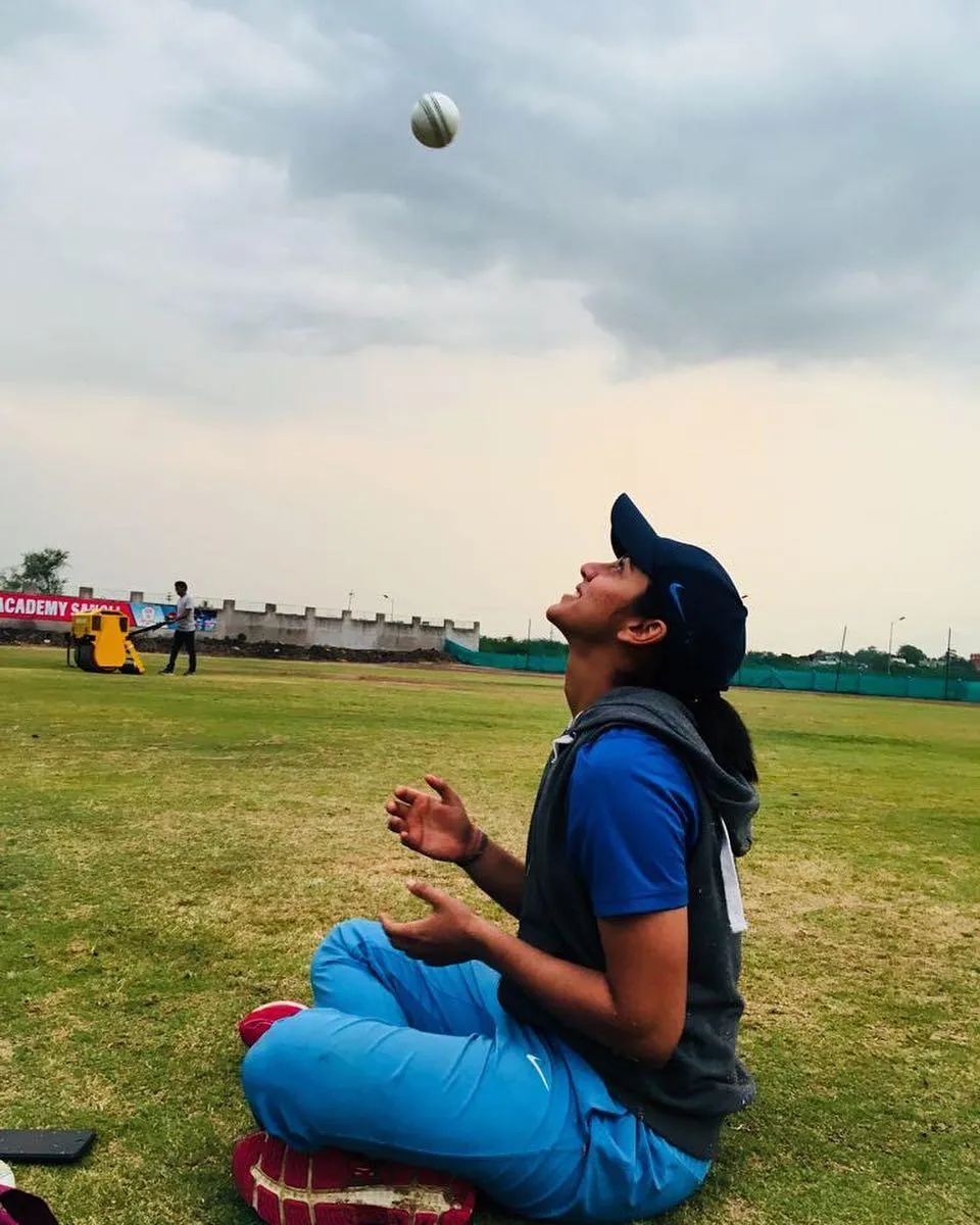 Smriti Mandhana having a relaxed moment on the ground