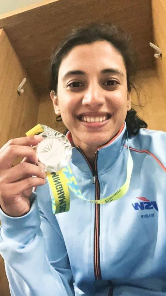 Smriti Mandhana Holding Medal and Smiling Proudly wallpaper