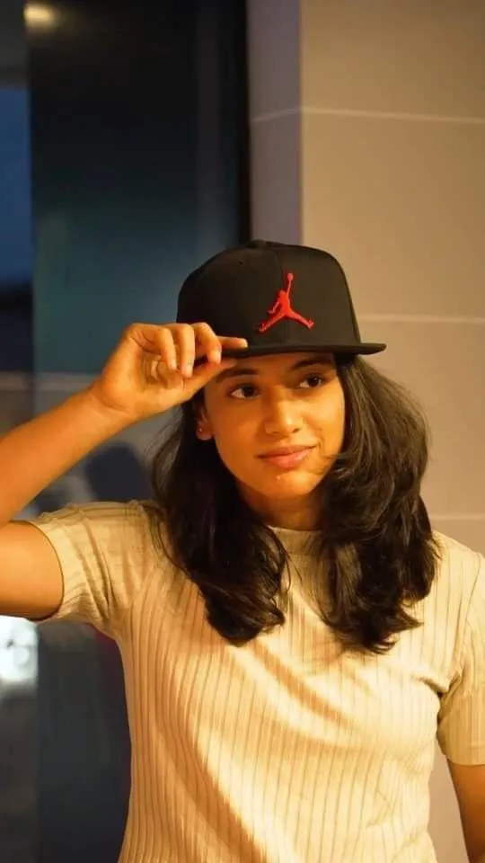Smriti Mandhana in a Blue Cap Fielding Position wallpaper