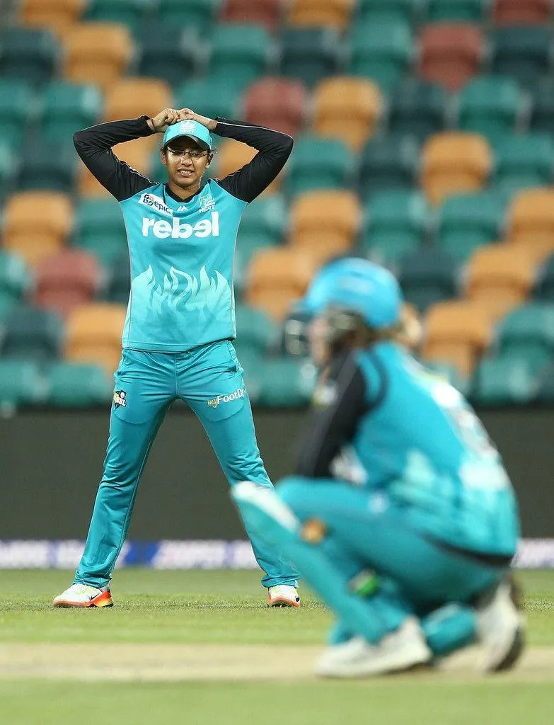 Smriti Mandhana in a fielding pose during a match wallpaper