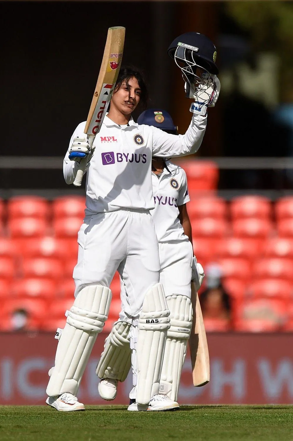 Smriti Mandhana in action during a cricket match HD wallpaper