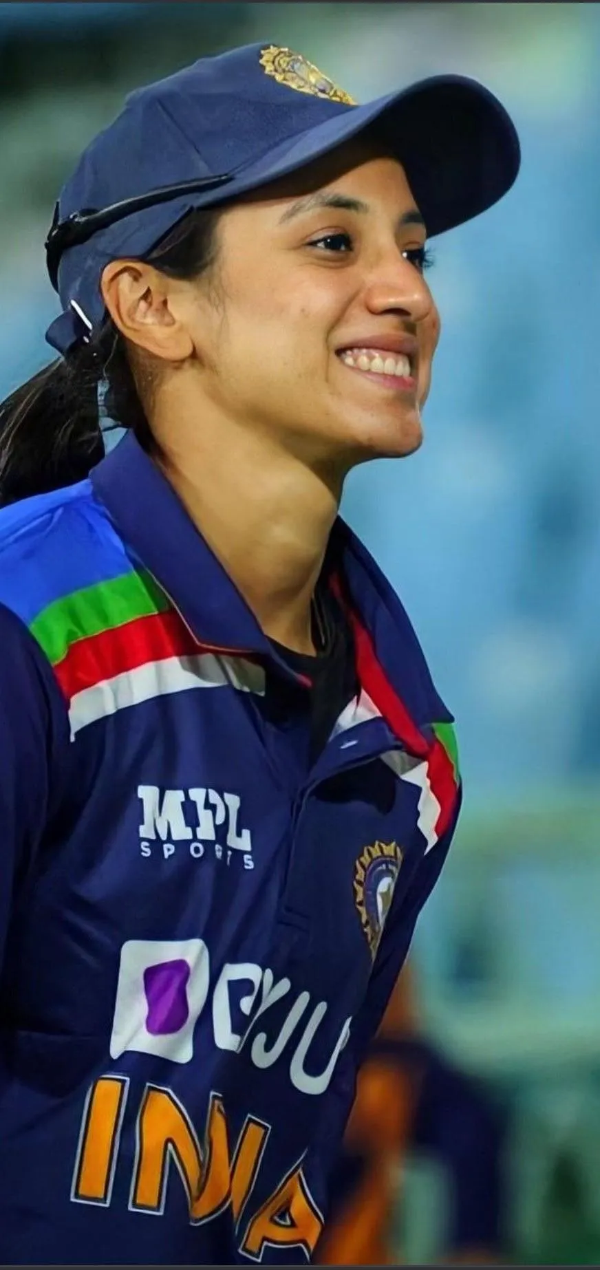 Smriti Mandhana in action during a cricket match wallpaper
