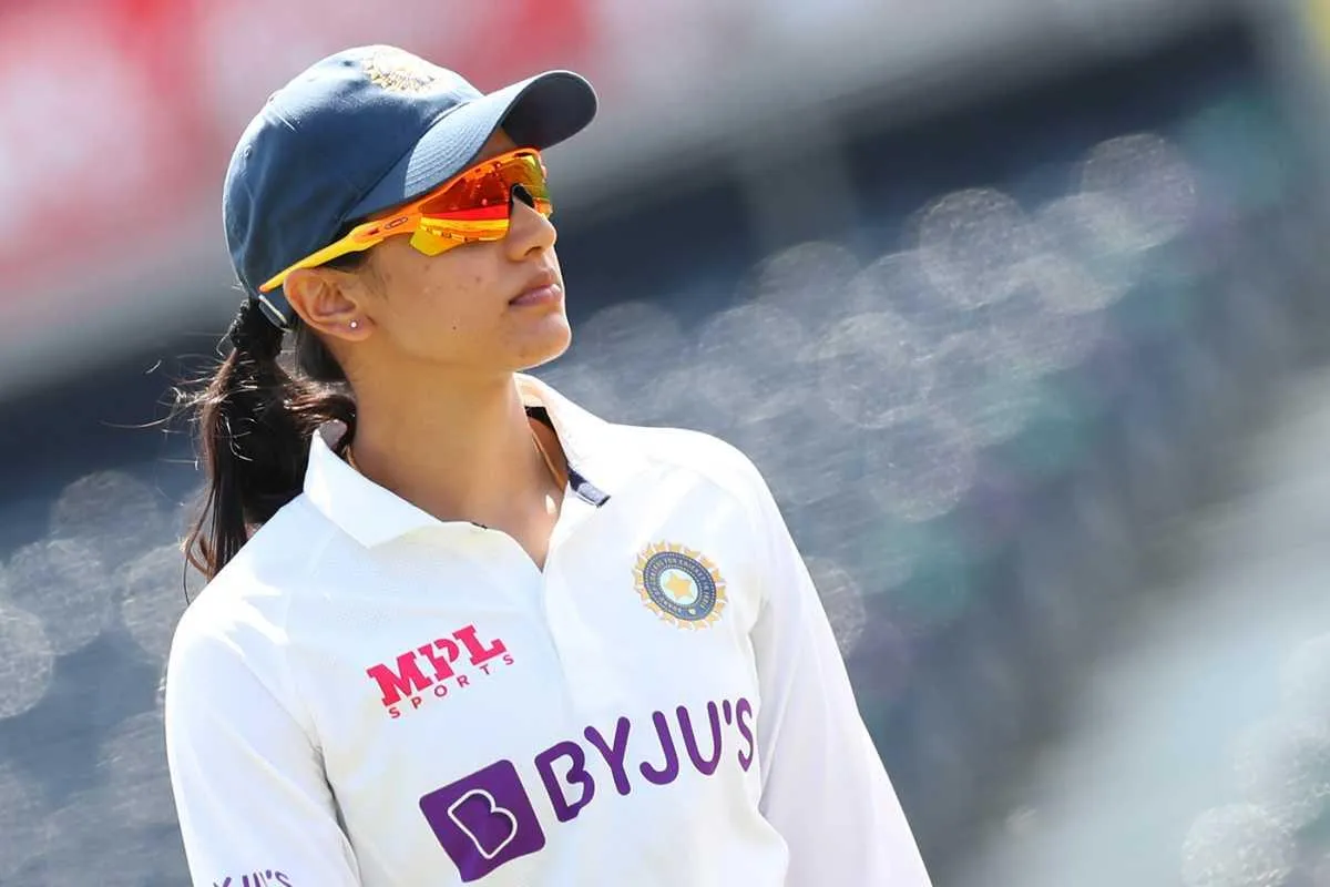 Smriti Mandhana in Cap Giving a Side Look wallpaper