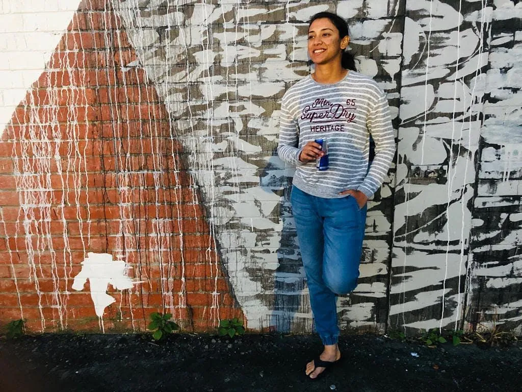Smriti Mandhana in casual attire postmatch wallpaper