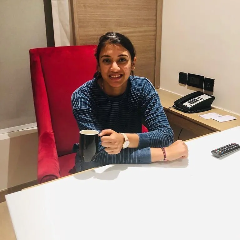 Smriti Mandhana in Cricket Gear with Focused Expression