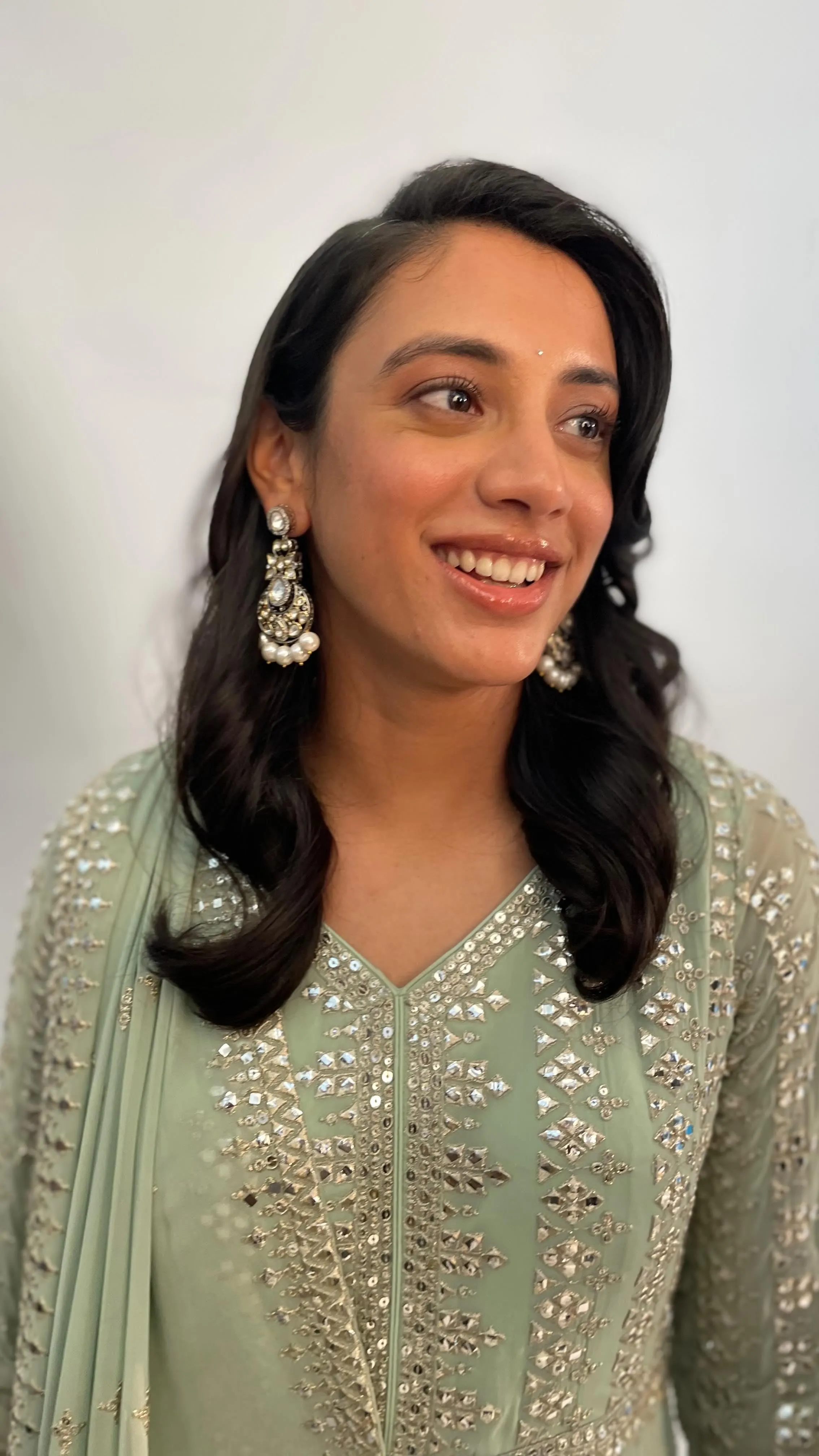 Smriti Mandhana in Ethnic Dress Smiling Indoors wallpaper