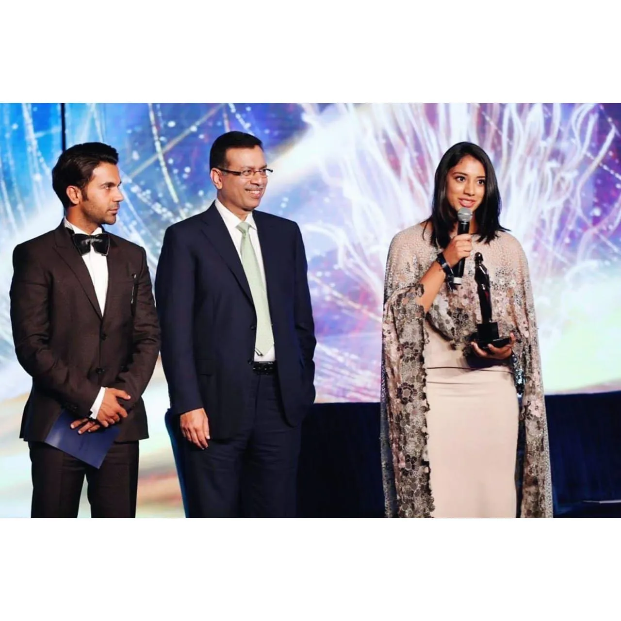 Smriti Mandhana in formal wear attending an event wallpaper