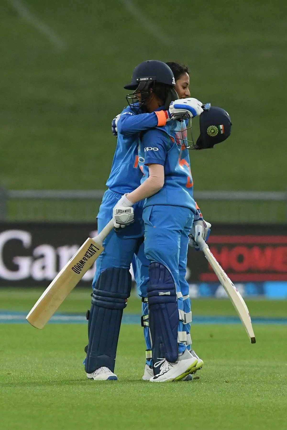 Smriti Mandhana in India blue jersey hitting a shot wallpaper