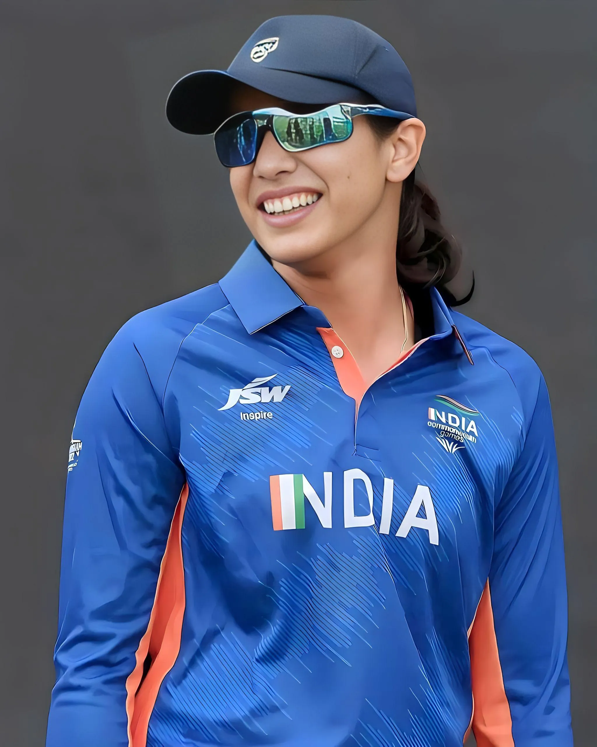 Smriti Mandhana in India jersey and sunglasses on match day