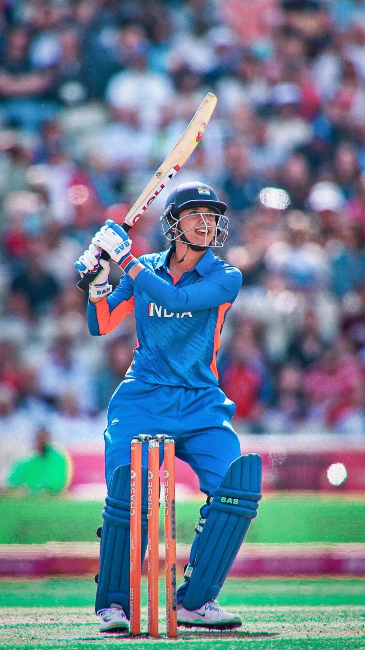 Smriti Mandhana in live cricket action during stadium match