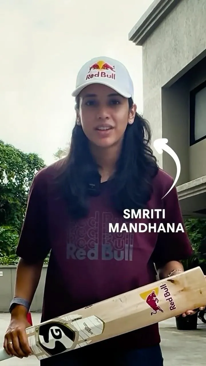 Smriti Mandhana in Stylish Outfit Walking Across Green Field